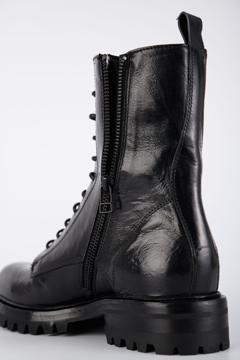 Jet-black military boots